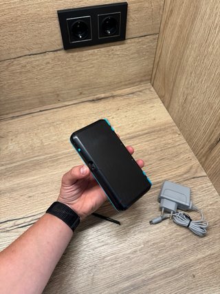 New nintendo 2DS XL negra y azul