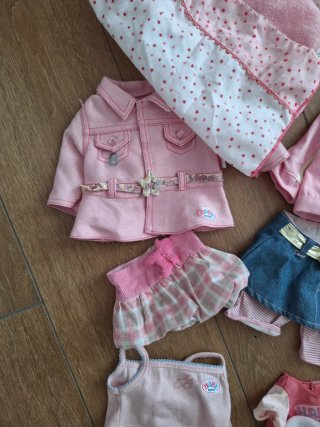 Muñecas en hamaca rosa+ trolley+ropitas
