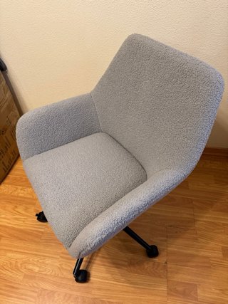 Sillón giratorio de tela