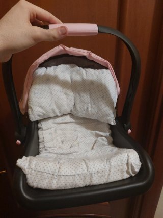Bambola con seggiolino auto e Biberon