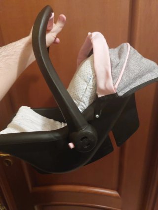 Bambola con seggiolino auto e Biberon