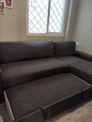 Sofá modular gris de tela