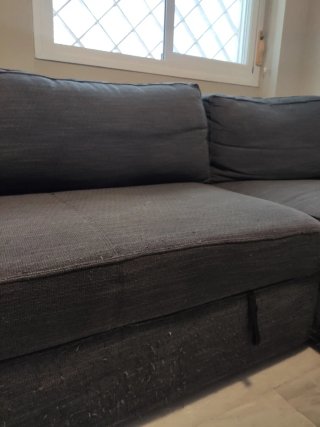 Sofá modular gris de tela