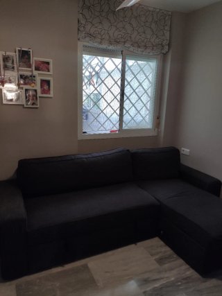 Sofá modular gris de tela