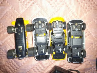 Circuito Scalextric con 4 coches y pórtico