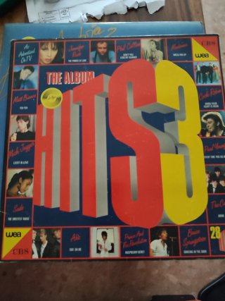 Discos de vinilo y película VHS