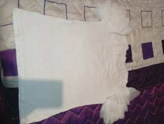 Camiseta blanca con volantes.SOLO ENVIOS