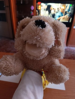 Peluche de pato y perro musical