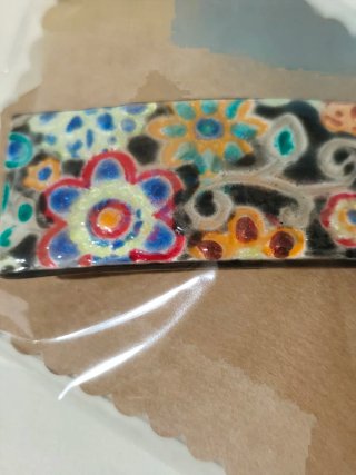 Pasador artesanal floral multicolor