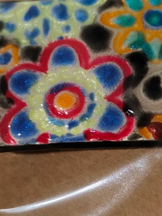Pasador artesanal floral multicolor