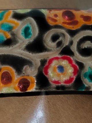 Pasador artesanal floral multicolor