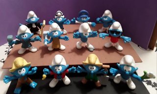 Lote 12 figuras promocionales Los Pitufos
