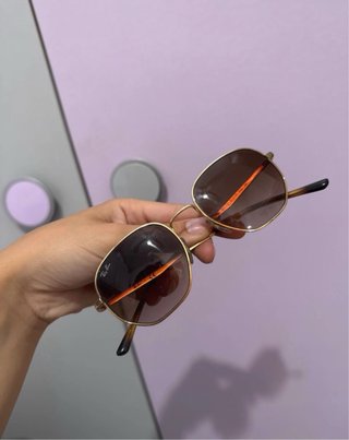 Occhiali da sole Ray-Ban oro e marroni