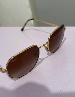 Occhiali da sole Ray-Ban oro e marroni