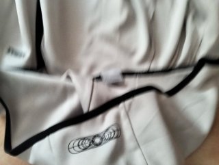 Conjunto deportivo Nike beige y negro