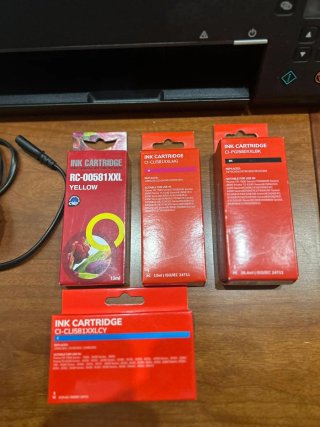 Impresora Canon Negra + Cartuchos