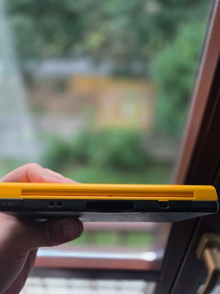 Nintendo DSI XL Giallo con accessori
