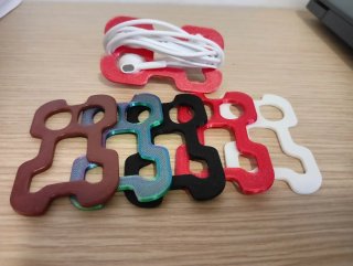 Organizzatore cuffie anti-nodo + auricolari