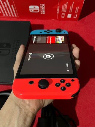 Nintendo Switch OLED con accessori