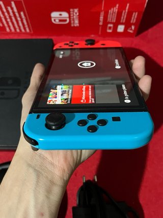 Nintendo Switch OLED con accessori