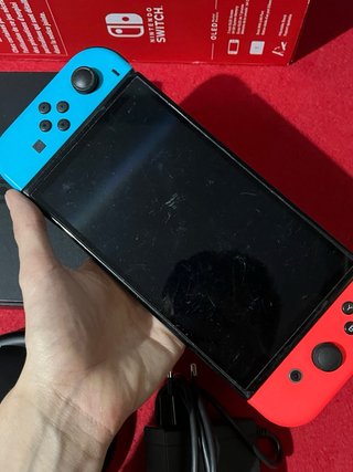 Nintendo Switch OLED con accessori