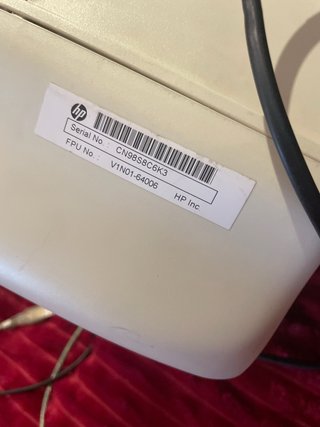 Impresora HP azul y blanca