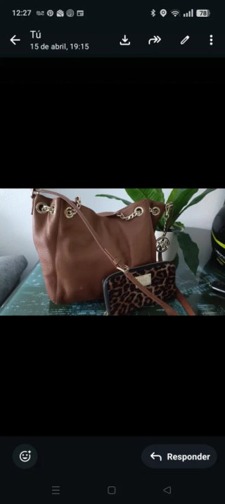 Bolso Michael Kors y cartera animal print