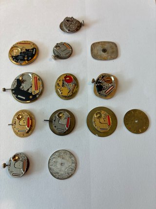 Lote 13 movimientos y esferas de reloj