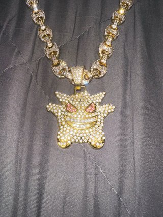 Reloj y Collar Dorado con Dijes