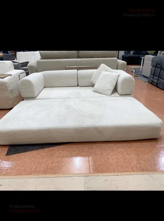 Divano beige a rullo in velluto