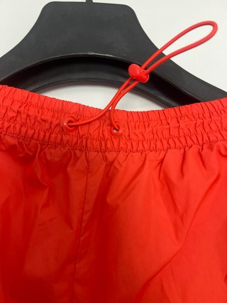 Pantalón chándal Adidas naranja y rosa