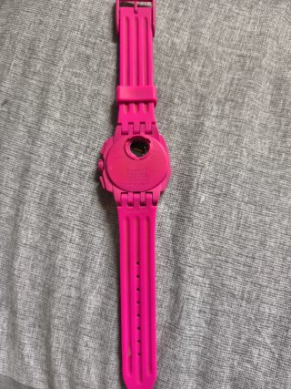 Reloj Swatch Swiss Rosa sin tapa de bateria