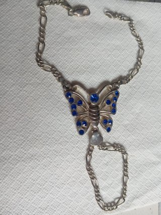 Pulsera de dedos mariposa plata