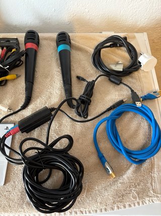 Playstation 3 con 3 juegos Singstar