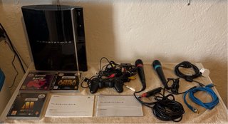 Playstation 3 con 3 juegos Singstar