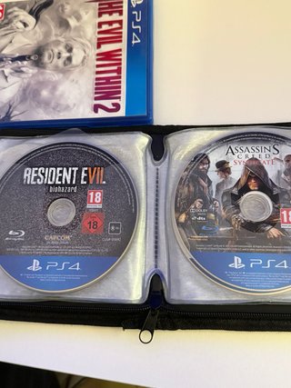 PS4 Slim 1TB + 2 mandos + cargador + 20 juegos