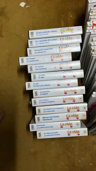 Libros y cinta VHS del cuerpo humano