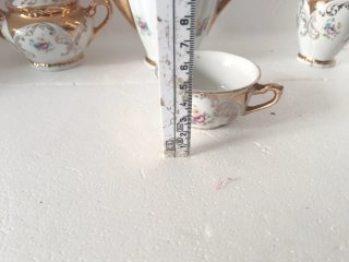 Servizio da caffè in porcellana oro e bianco