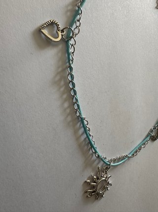 Collana con ciondoli sole,cuore e luna