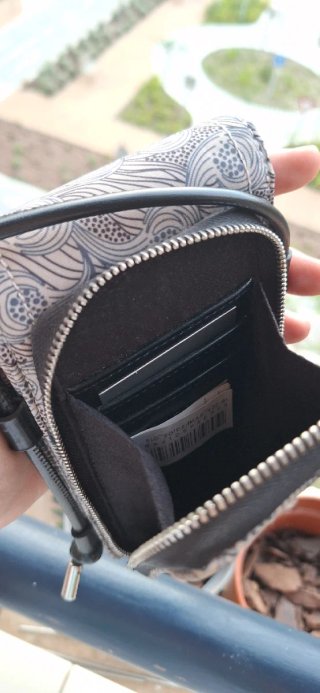 Bolso móvil Parfois estampado floral