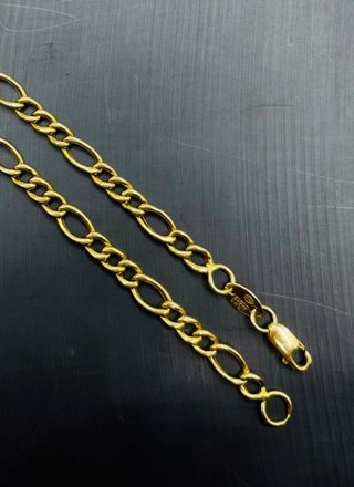 Cadena Fígaro 1x3 Oro 18K. Peso 11,26g.