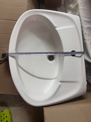 Lavabo de cerámica con pie