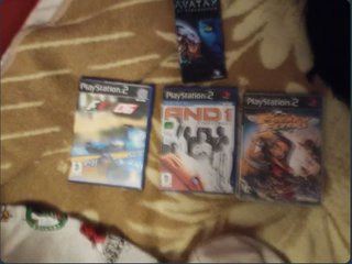 Lotto di videogiochi e placca metallica di Tekken 8