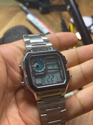 Reloj Casio AE1200 Plata