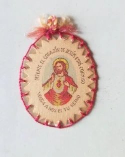 Antiguo Detente Bala con funda Sagrado Corazón