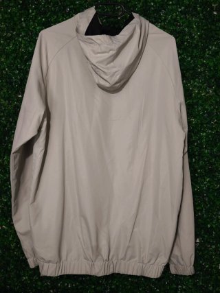 Giacca a vento Nike beige e nera
