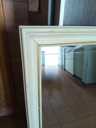 Espejo grande de pared.