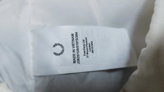 Cortavientos Fred Perry Blanco y Amarillo
