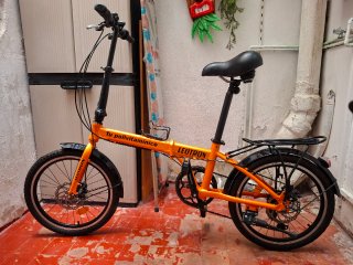 BICICLETA PLEGABLE NARANJA LEOTRON CN MEJORAS AÑAD