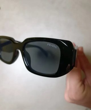Occhiali da sole Prada neri unisex